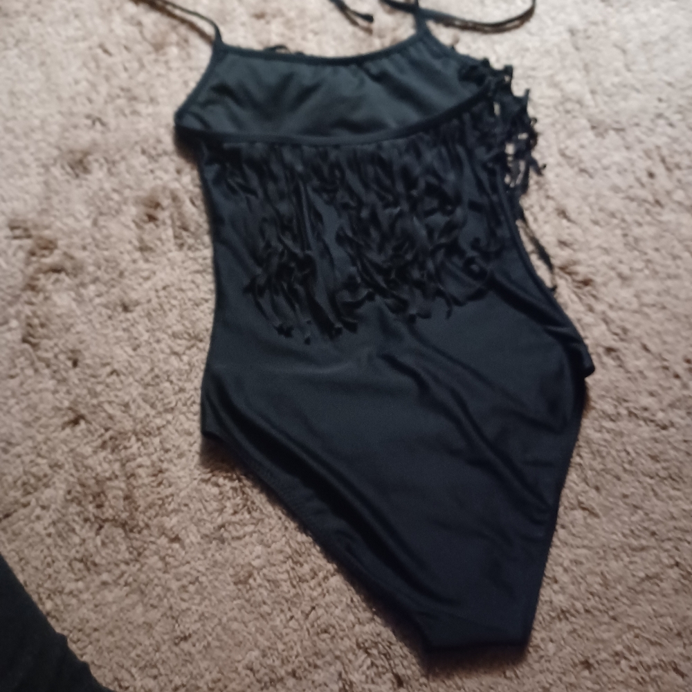 Black one piece bathing suit with fringe